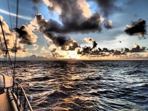 sailing around the world sunrise open ocean