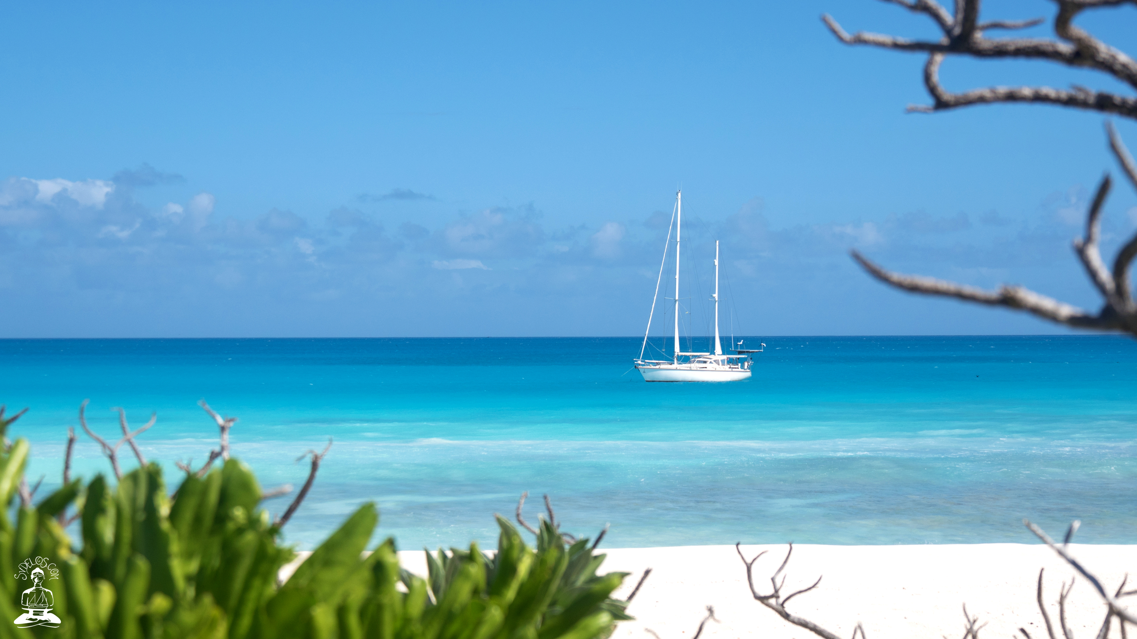 sailboat secluded anchored tropical island desktop background